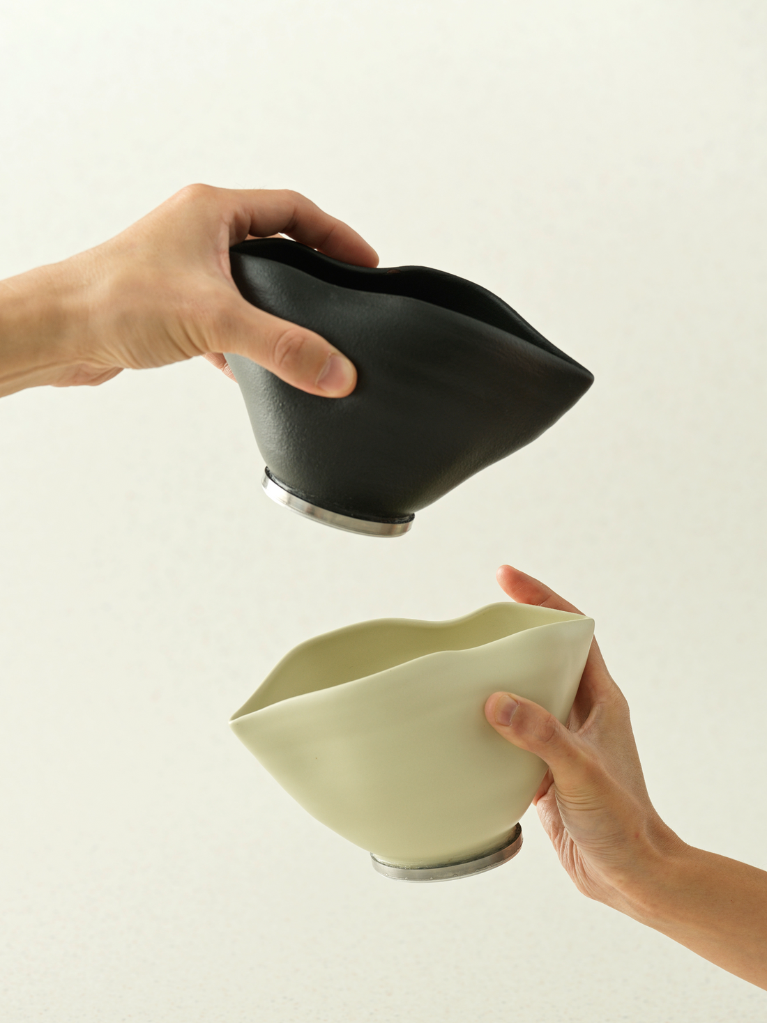 Two handmade tea bowls